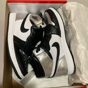 Jordan 1 high silver toes .